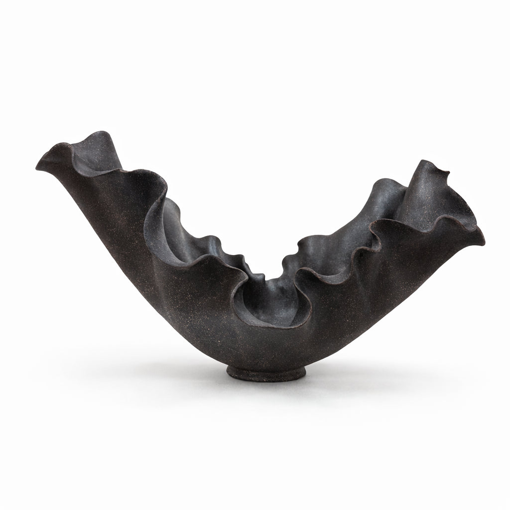 Held in the Fold — sculptural stoneware vessel